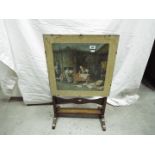 A small fold top table / fire screen having print to the top.