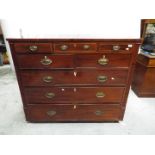 A substantial mahogany chest of three over two over three drawers, carved detailing,