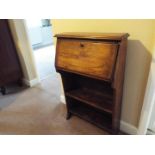 A small oak bureau bookcase, approximately 98 cm x 61 cm x 24 cm.