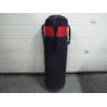 A Locus punch bag, approximately 21 Kg.