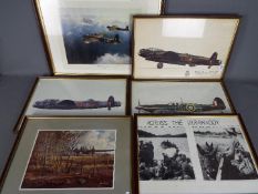 A collection of pictures and prints of military interest to include a Robert Taylor print