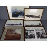 A collection of pictures and prints of military interest to include a Robert Taylor print
