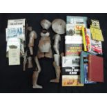 A quantity of books of military interest and other and a model depicting a suit of armour