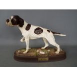 Beswick - a Beswick figure entitled The Pointer Dog with Royal Doulton backstamp, 21 cm.