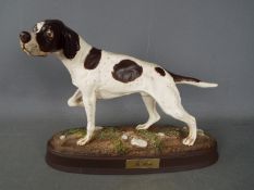 Beswick - a Beswick figure entitled The Pointer Dog with Royal Doulton backstamp, 21 cm.