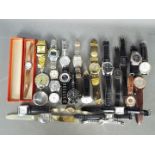 A quantity of modern wristwatches and similar, lady's and gentleman's.