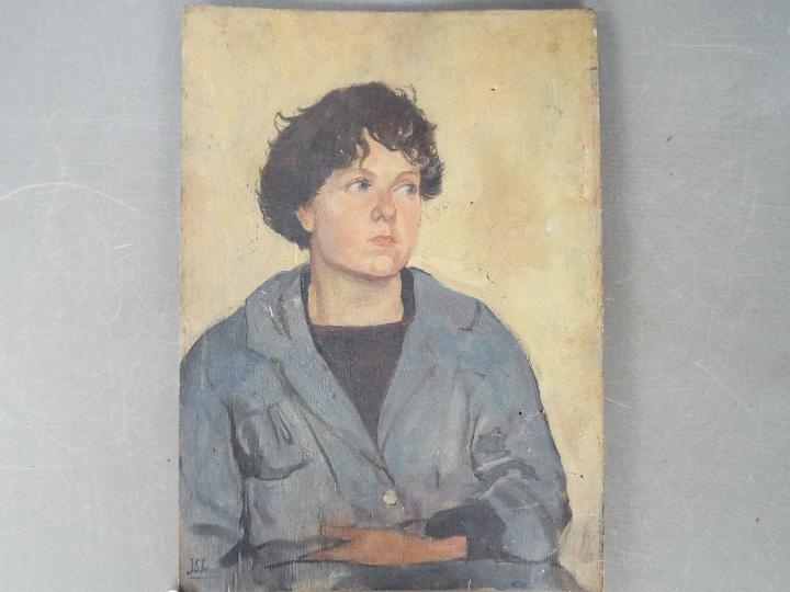A small, unframed oil on panel, portrait of a young lady, signed lower left JSJ and dated 1920,