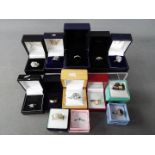 A collection of costume jewellery dress rings, all boxed.