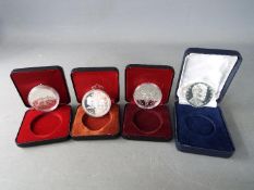 Three silver 1 dollar Canada coins comprising 1980,