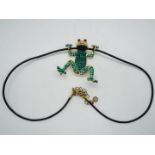 Butler & Wilson - a Butler & Wilson necklace with pendant in the form of a stone set frog with