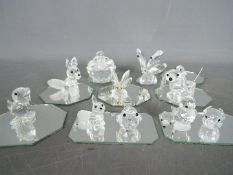 A collection of Swarovski crystal figures, predominantly animals, to include butterflies, foxes,