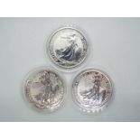 Three silver 1 ozt, .999 fineness 2020 Britannia £2 coins contained in capsules.