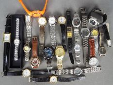 A quantity of modern wristwatches and similar, lady's and gentleman's.