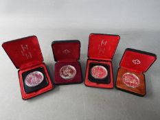 Four silver 1 dollar Canada coins comprising 2 x 1976, 1981 and 1983, all cased.