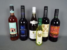 Six bottles of alcohol comprising sherry, wine, limoncello.