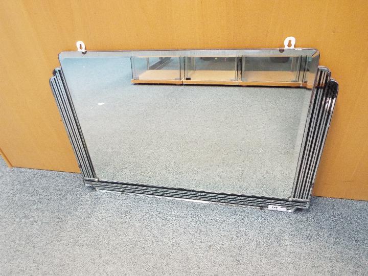 An Art Deco bevelled wall mirror, approximately 49 cm x 74 cm.