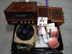 A Garrard 5200 turntable and speakers and a quantity of vinyl records (78's and 33's),