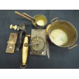 A quantity of vintage kitchenalia to include marmalade cutter, knife cleaner, pans and similar.