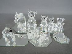 A collection of Swarovski crystal figures, predominantly animals, to include elephants,