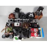 Photography - A collection of cameras and photographic equipment to include a Praktica LLC,