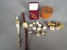 Two lady's wristwatches comprising Rotary and Reflex and a small quantity of costume jewellery and