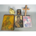 A small collection of religious iconography including a brass Buddha and similar.