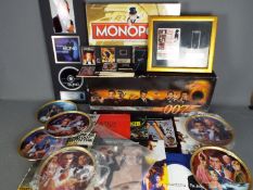 James Bond - A mixed lot of James Bond memorabilia and collectables to include boxed Widescreen VHS