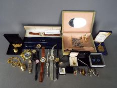 A collection of watches and a small quantity of costume jewellery.