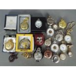 A collection of modern pocket watches, watch chains and similar.