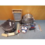 A Pearl Professional snare drum and percussion accessories.