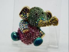 Butler & Wilson - a Butler & Wilson multicoloured stone set brooch in the form of an elephant,
