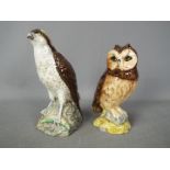 Two ceramic whisky decanters (with contents) modelled as birds of prey comprising a Royal Doulton