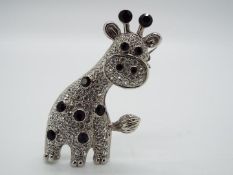 Butler & Wilson - a Butler & Wilson stone set brooch in the form of a giraffe,