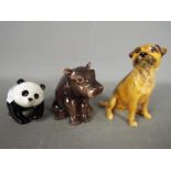 Beswick - Three Beswick animal figurines comprising Panda Cub, Hippo Calf and a Border Terrier,