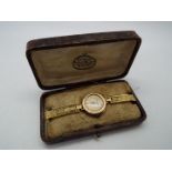 A lady's 9ct gold cased wristwatch, Arabic numerals to the dial marked 'Bateman's St Helens',
