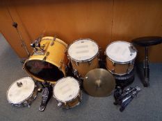 A Pearl 'World Series' drum kit comprising bass drum, floor tom, 2 x rack tom, hi-hat,