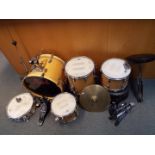 A Pearl 'World Series' drum kit comprising bass drum, floor tom, 2 x rack tom, hi-hat,