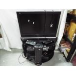 A television stand with 26" Panasonic LCD television, Panasonic DVD player and similar.