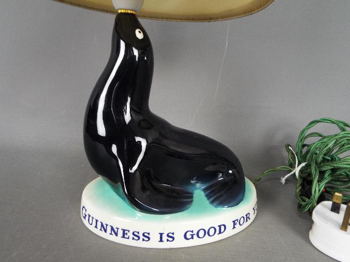 Breweriana - A Guinness advertising table lamp by Carlton Ware modelled as a sealion, - Image 2 of 5