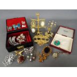A quantity of costume jewellery, brooches and similar, a lady's Smiths wristwatch (bracelet A/F),