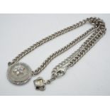 Butler & Wilson - a Butler & Wilson necklace with stone set circular pendant with star,