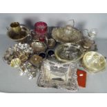 A mixed lot of plated ware.