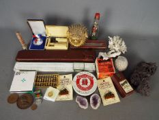 A mixed lot to include Danish slide rule, mineral samples, preserved puffer fish,