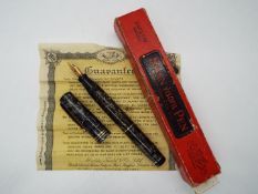 A boxed Swan Visofil fountain pen with 14ct nib.