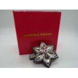 Butler & Wilson - a Butler & Wilson stone set hair clip in the form of a flower,