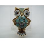 Butler & Wilson - a Butler & Wilson stone set brooch in the form of an owl,