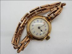 A lady's 9ct gold cased wristwatch on expanding 'Britannic' bracelet,