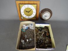 A large quantity of predominantly UK coins, a clock and barometer.