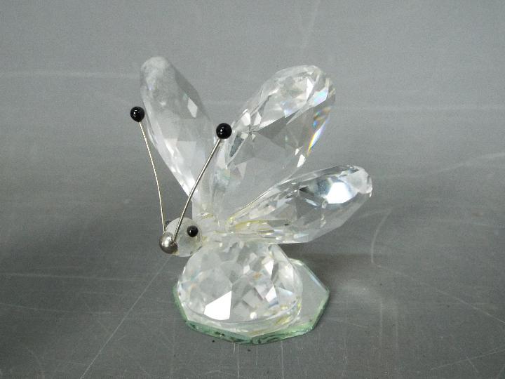 A collection of Swarovski crystal figures, predominantly animals, to include butterflies, foxes, - Image 3 of 4