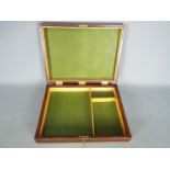 A good quality inlaid wooden box with sectional interior and key,